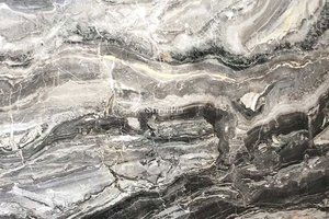 A dark grey marble with light caramel streaks.