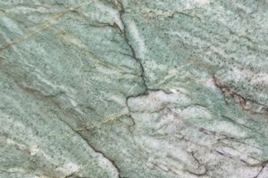 A green quartzite with layered texture and natural variation.