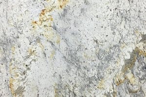 A white granite with grey variations and silver and gold veining