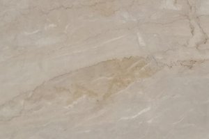 A beige granite with soft flowing bands and subtle mineral veining.