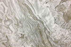 High movement marble with dense wispy veins of gold, grey and brown.
