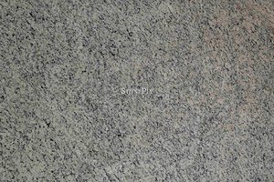 A granite with a mix of cream, white and grey colors.