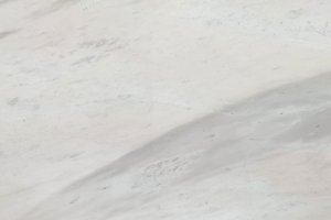 A soft white marble with subtle gray veining.
