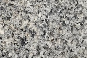 A light gray granite with fine black and white speckling.