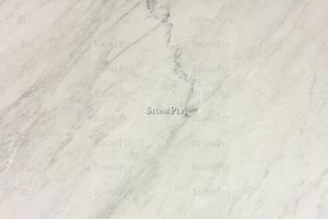 A grey and white marble with veins.
