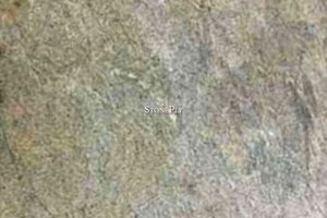 A light green and grey granite with gold veins.