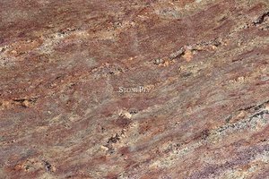 A brown granite with red and grey veining pattern.