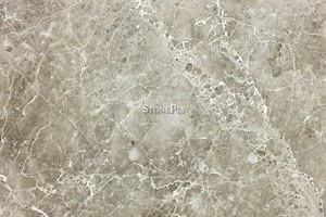 A creme and brown marble with thin white veining.