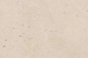 A light cream limestone with subtle tonal variation and fine fossil speckling.