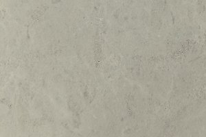 A light cream limestone with a soft, uniform texture and subtle fossil-like markings.