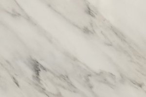 A white marble with bold gray veining and soft gold accents.