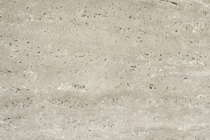 A warm beige travertine with soft tonal variation and natural pitting.