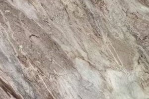 A granite with gray, brown, and white flowing movement.