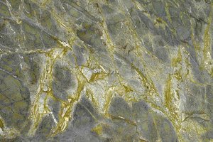 A green granite with gold veins.