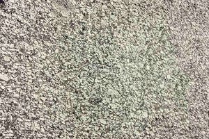 A grey and black granite with a speckled pattern.