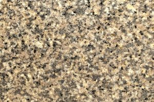 A beige granite with a fine, even speckle.