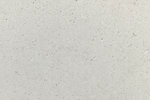 A light ivory limestone with soft speckling.