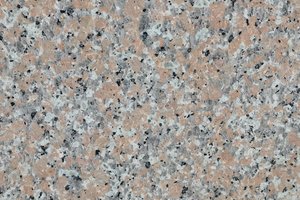A pink and gray granite with black speckling.