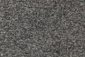 A dark charcoal granite with fine, consistent black and gray speckling.