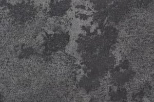 A dark gray limestone with subtle cloudy movement and faint tonal variation.