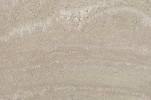 A beige travertine with soft horizontal banding.