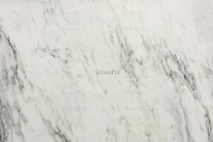 A white marble with soft grey veining.