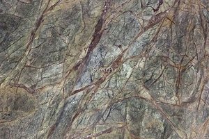 A light and dark green marble with brown and beige veins.