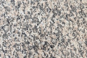 A light pink granite with fine black and gray speckling.
