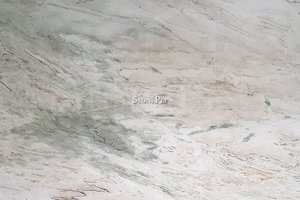 A white granite with grey veins.