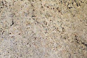 A white granite with brown flakes.