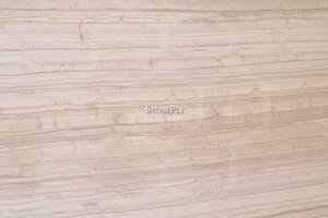 A grey and beige marble with a a veined pattern.