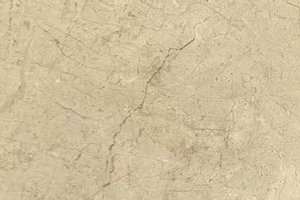 A beige marble with a veined texture.