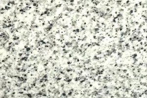 A white and grey granite with flecks.