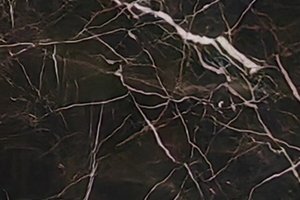 A brown marble with flecks.