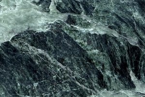 A deep green marble with subtle veining.