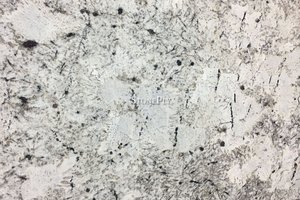 A white granite with grey and gold veins.