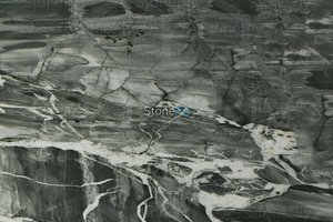 A granite with both lighter and darker greys.