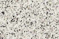 A medium grained, white granite with light grey muscovite.