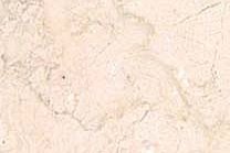 A white and beige marble with thin veins.