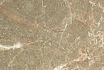 A beige marble with veins of pink and white and a brownish rose background.