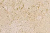 A beige marble that contains fossil traces.