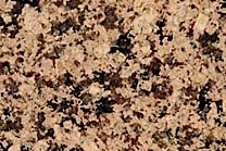 A coarse grained, brown granite.