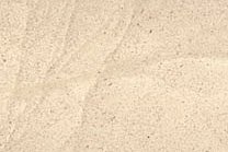A cream colored limestone with a water texture.
