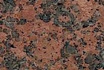 A red and black granite with a coarse texture.