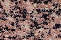 A pink granite with black pieces.