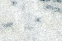 A white marble with grey veining.