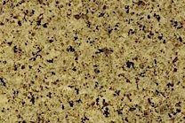 A yellow granite that is medium grained.