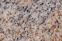 A goldish granite that has a varying color.