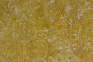 A gold limestone with white accents.