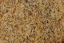 A yellow and gold granite with a black veined texture.